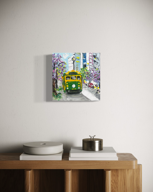 Across Town Melbourne tram painting displayed above a wooden console in a neutral interior
